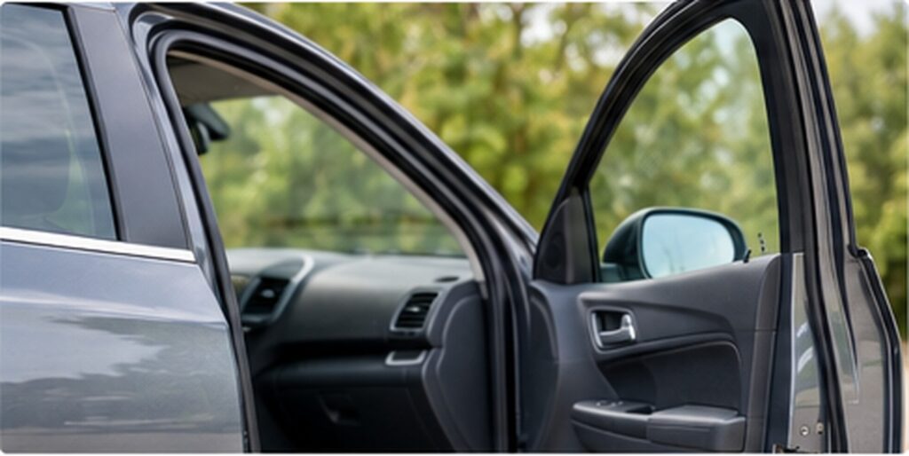 Rubber car door seal fitted around a vehicle door opening
