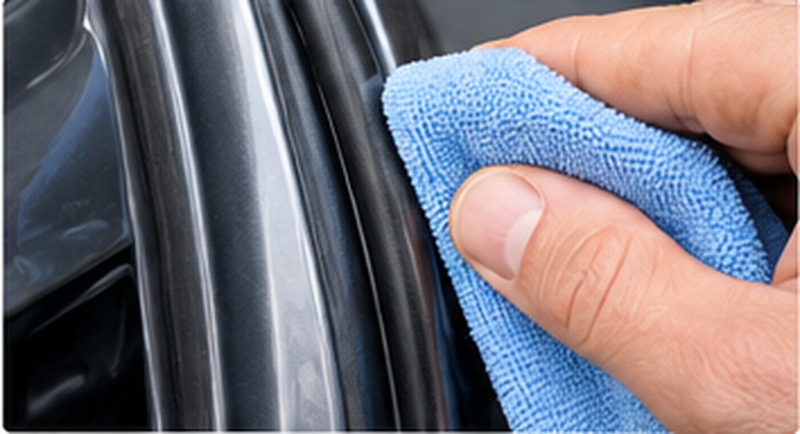 Cleaning a rubber car door seal to remove dirt and debris